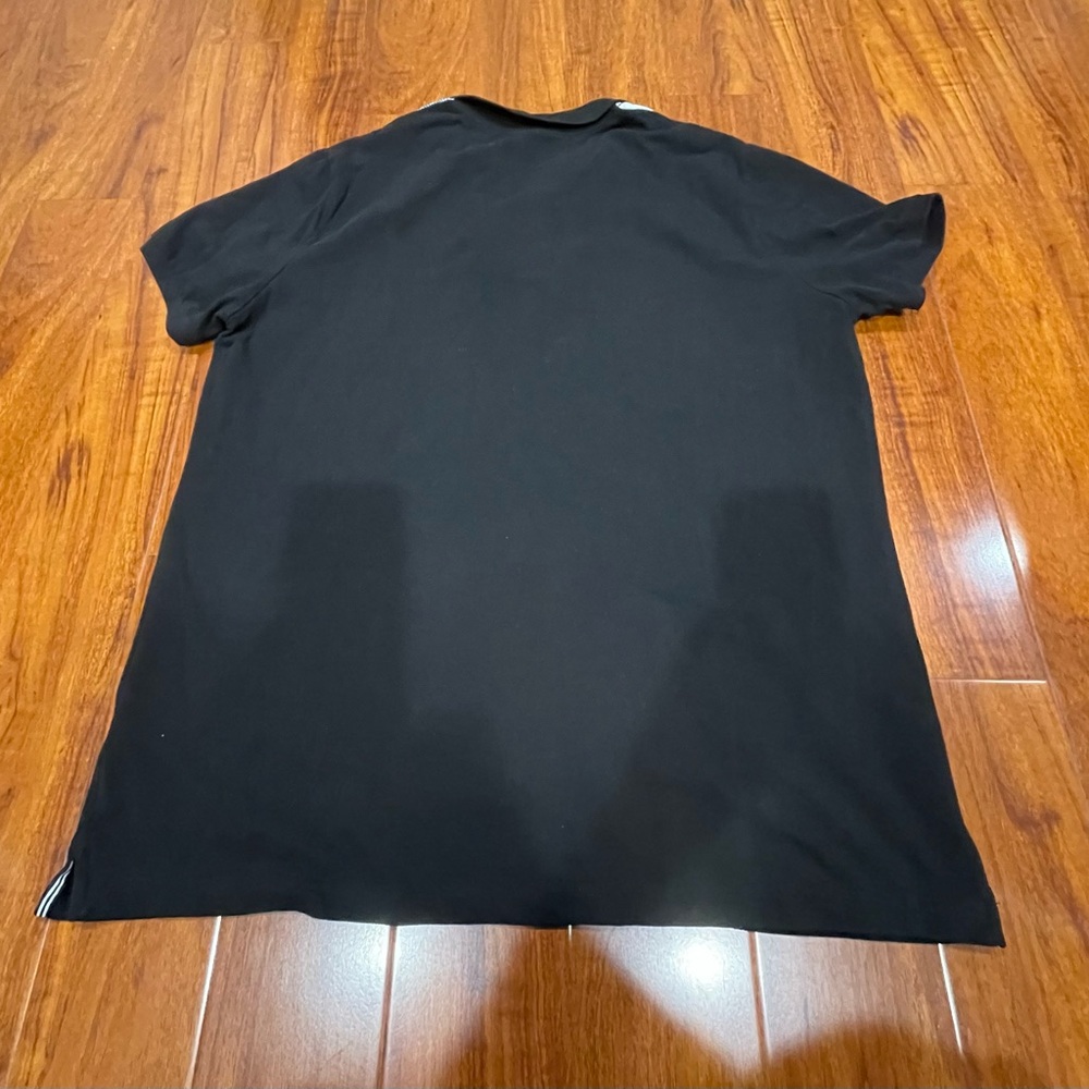 Stylish Black Polo Shirt with White Accents - Picture 4 of 10